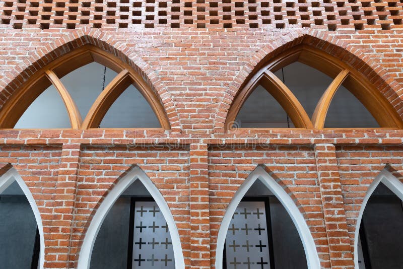 Arch old facade or entrance of brick wall and wooden architecture royalty free stock photos