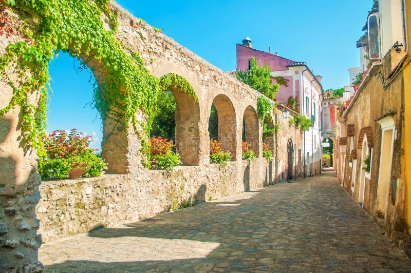 Old european street with stone wall royalty free stock images