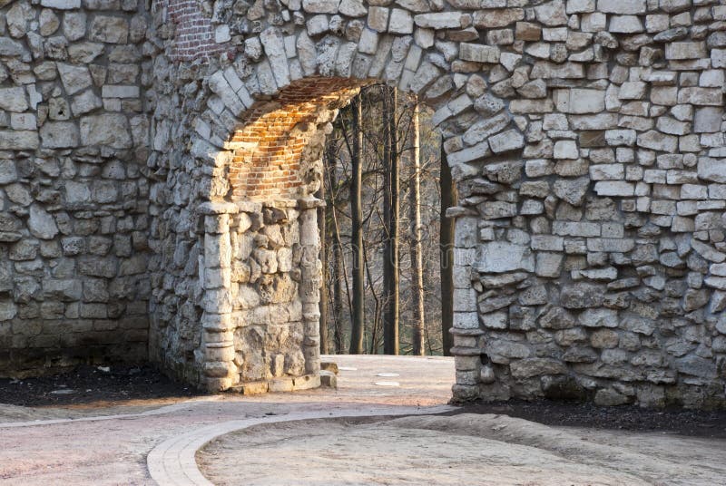 Stone wall with an arch royalty free stock image